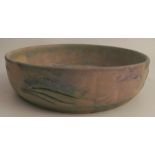 A 1930's Denby Danesby Ware pastel blue bowl, decorated with fish and seaweed, designed by Donald