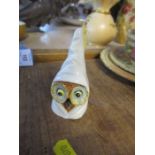 A Royal Worcester owl candle snuffer