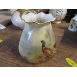 A Royal Worcester blush ivory vase, the front decorated with pheasants in landscape by Jas