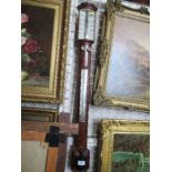 A 19th century mahogany stick barometer, Rossi Norwich, length 38ins