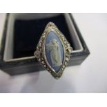 A ring set with a Wedgwood blue jasper plaque