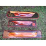 Three reproduction painted half block models of 19th century boats, widths 36ins, 43ins , 44ins