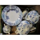 A box of Barratts dinnerware, decorated in a blue grape pattern