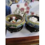 A pair of cloisonne bowls, on wood bases, together with three cloisonne eggs and a hardstone tree