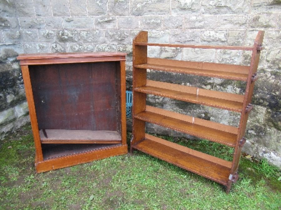 An Arts and Crafts style set of oak shelves, width 39ins x height 49ins, together with a mahogany