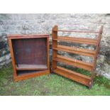 An Arts and Crafts style set of oak shelves, width 39ins x height 49ins, together with a mahogany