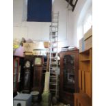 Two sets of aluminium ladders