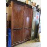 A mahogany two door wardrobe, width 49ins, height 81ins