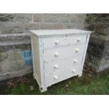 A white painted chest of drawers, with two short drawers above three long drawers, width 41ins x