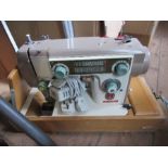 A cased electric sewing machine