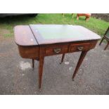 An Edwardian buur walnut desk, having inlaid decoration, with leather writing top and two drawers,