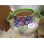 A Crown Ducal Charlotte Rhead two handled vase, decorated with flowers, af, height  6ins,