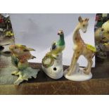 Royal Worcester model fledgling goldfinch, together with a study of giraffe and peacock
