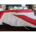 A Union Jack flag, 34ins x 69ins, together with two cases containing assorted braids, embroidery