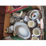 A box of Denby dinner and tea ware