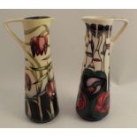Two Moorcroft Pottery ewers, dated 1995 and 2001, the one designed by Davenport, height 9.5ins