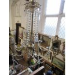 A six branch glass chandelier, with gilt mounts