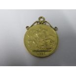 An 1887 £2 coin, or double sovereign, mounted