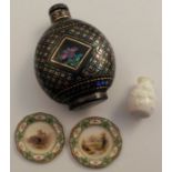 A papier mache snuff bottle, inlaid with mother of pearl and decorated with a flower, height 2.