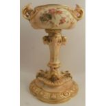 A Royal Worcester blush ivory pedestal bowl, decorated with flowers, with gilt moulded decoration,