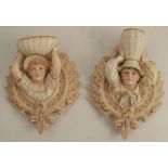 A pair of 19th century Royal Worcester wall pockets, modelled as Kate Greenway style children