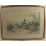 W E Powell, colour print, ducks in flight over water, 13ins x 19ins, together with two framed oval