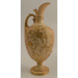 A Royal Worcester blush ivory ewer, richly gilded with roses and leaves, raised on a pedestal