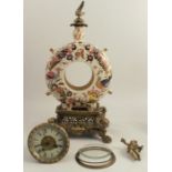 A mantel clock, with Zsolney porcelain case, housing the drum movement, raised on a pierced gilt