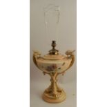 A Royal Worcester blush ivory oil lamp, decorated with floral sprays, butterflies and insects by