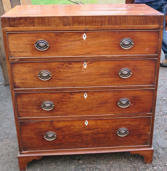 A 19th century mahogany chest, of four long drawers, 36ins x 18ins, height 41ins