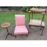 A low upholstered nursing chair, together with a tripod table, a cane topped stool, and an oak stool