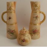 A pair of Royal Worcester blush ivory claret jugs, decorated with floral sprays, shape number