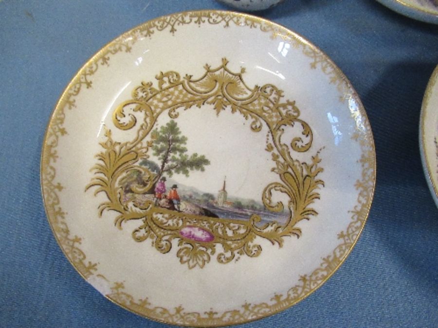 An 18th century coffee can and saucer, decorated in colours with figures in a landscape, together - Image 2 of 9