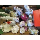 A box of Royal Worcester figures