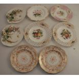 A pair of Mintons porcelain, with pierced borders, diameter 9.5ins, together with two other plates