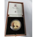 A gold 1981 proof £5 coin, in plastic slip