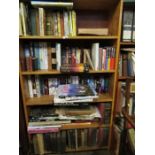 36954 - Five shelves of books, to include annuals, Cassells History of England, etc.