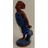 A Royal Worcester figure, of a young girl skipping, in terracotta and blue glaze, height 12.