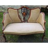 An Edwardian salon settee, with mahogany inlaid shield to the back, raised on cabriole legs, width