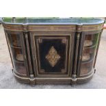 A Victorian ebony and inlaid credenza, fitted with a central cupboard flanked by two glazed bow