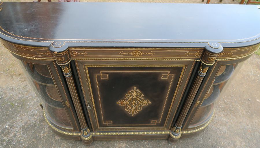 A Victorian ebony and inlaid credenza, fitted with a central cupboard flanked by two glazed bow - Image 2 of 6
