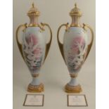 A pair of Royal Worcester limited edition covered pedestal vases, inspired by the original Baldwyn