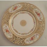 A Copeland porcelain cabinet plate, the pierced border with reserve decorated with flowers in