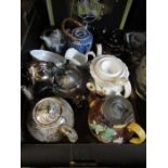 A box of assorted tea pots, to include Majolica example, together with a box of glass