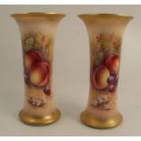 A pair of Royal Worcester spill vases, decorated half round with hand painted fruit by Townsend,