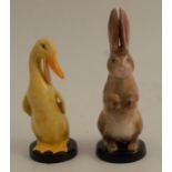 Two Royal Worcester models, a duck and a rabbit, both on black circular bases, model number 2843 and