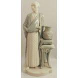 A Royal Worcester figure, of a Chinese man standing next to an urn on a plant stand, decorated in