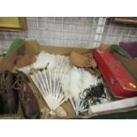 A collection of assorted fans, child's leather clogs, etc.