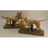 A pair of Royal Dux style models, of shooting dogs with game in their mouths, af, height 7.5ins