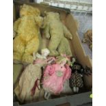 A collection of bears and dolls, to include two antique jointed bears, and four dolls, one dressed